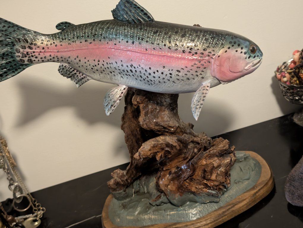 hand-carved and hand-painted wood sculpture of a Rainbow Trout,