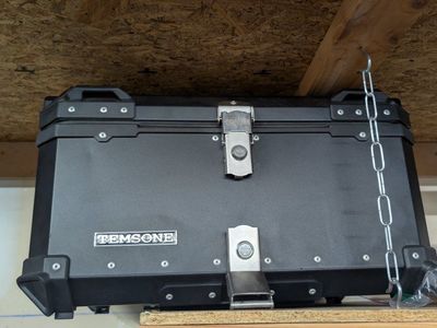 2 helmet rear motorcycle top case with universal mounting base.