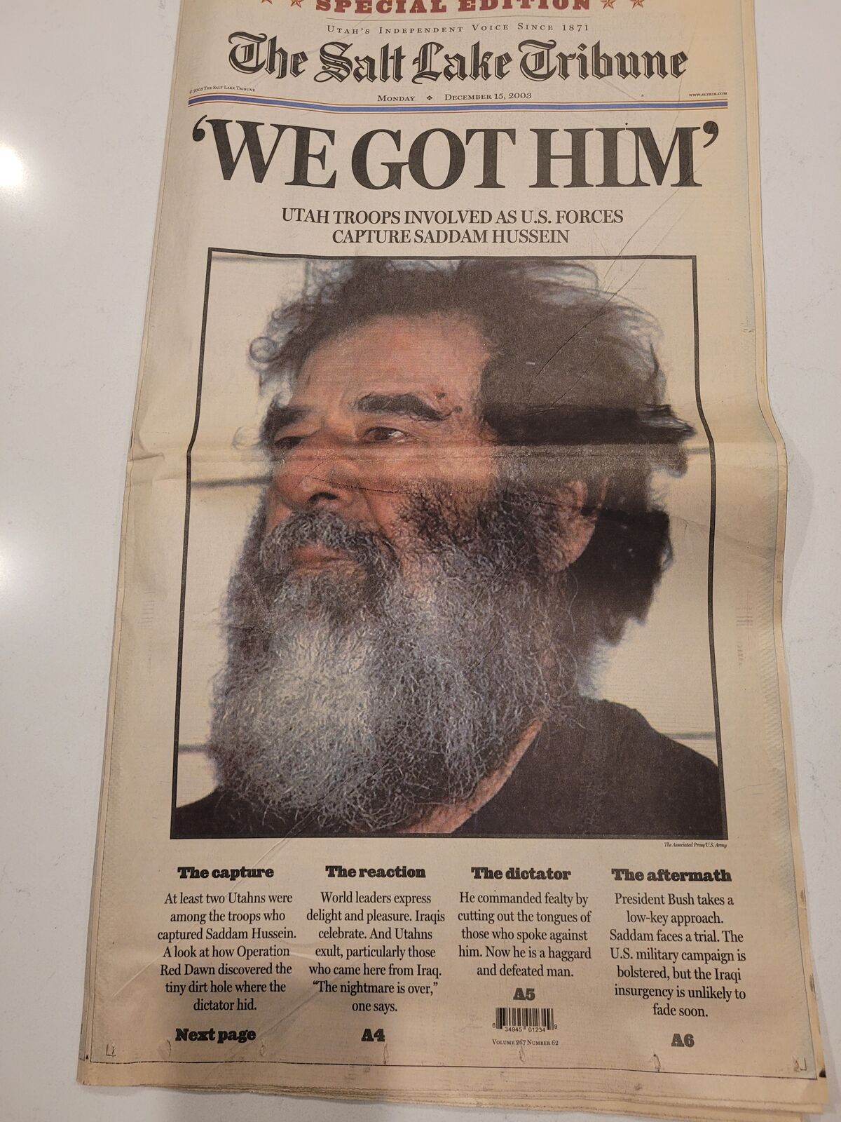 Salt Lake Tribune newspaper December 15 2003"We got Him"