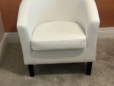 White faux leather accent barrel chair