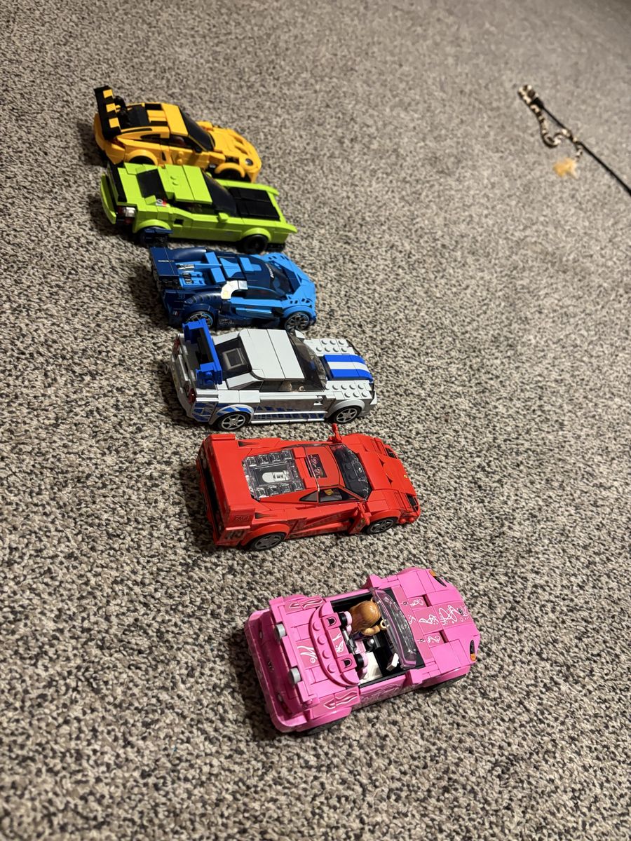 Lego cars, with boxes still.