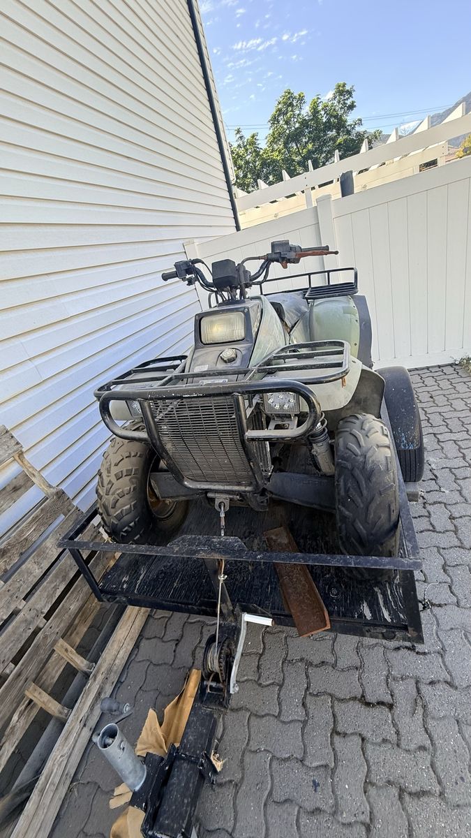 2005 Polaris Sportsman 400 all wheel drive with trailer
