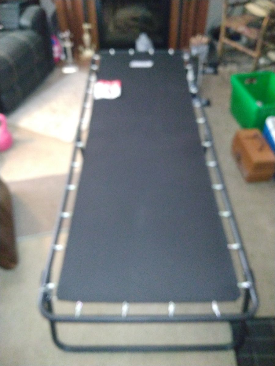 Large camp cot with pad by Coleman