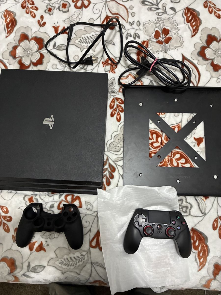 Sony PlayStation 4 (PS4) Pro 1TB Console Bundle with 1 Controller & Wall Mount