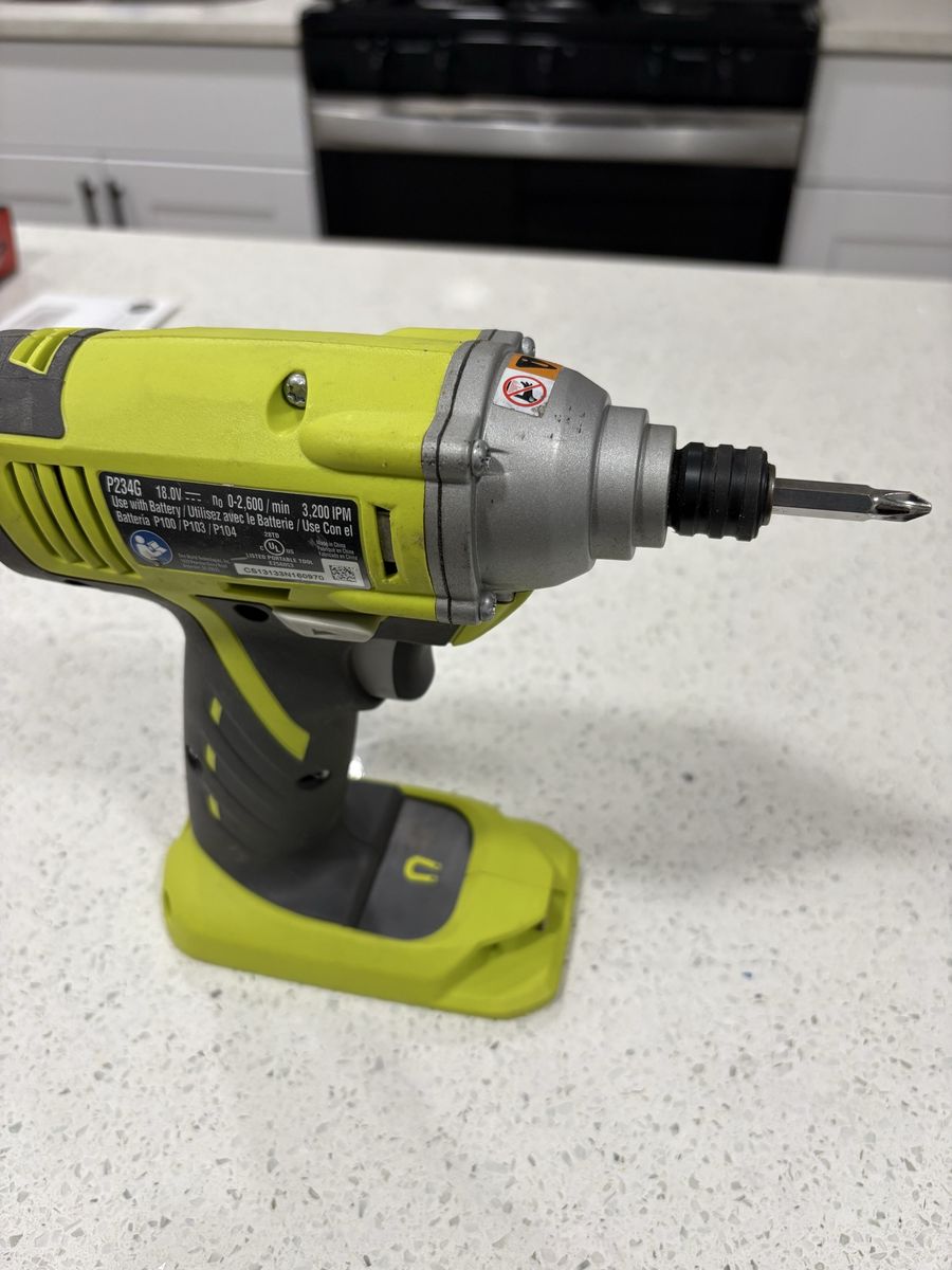 Ryobi Impact Driver, chainsaw, hedger, weed eater, and blower