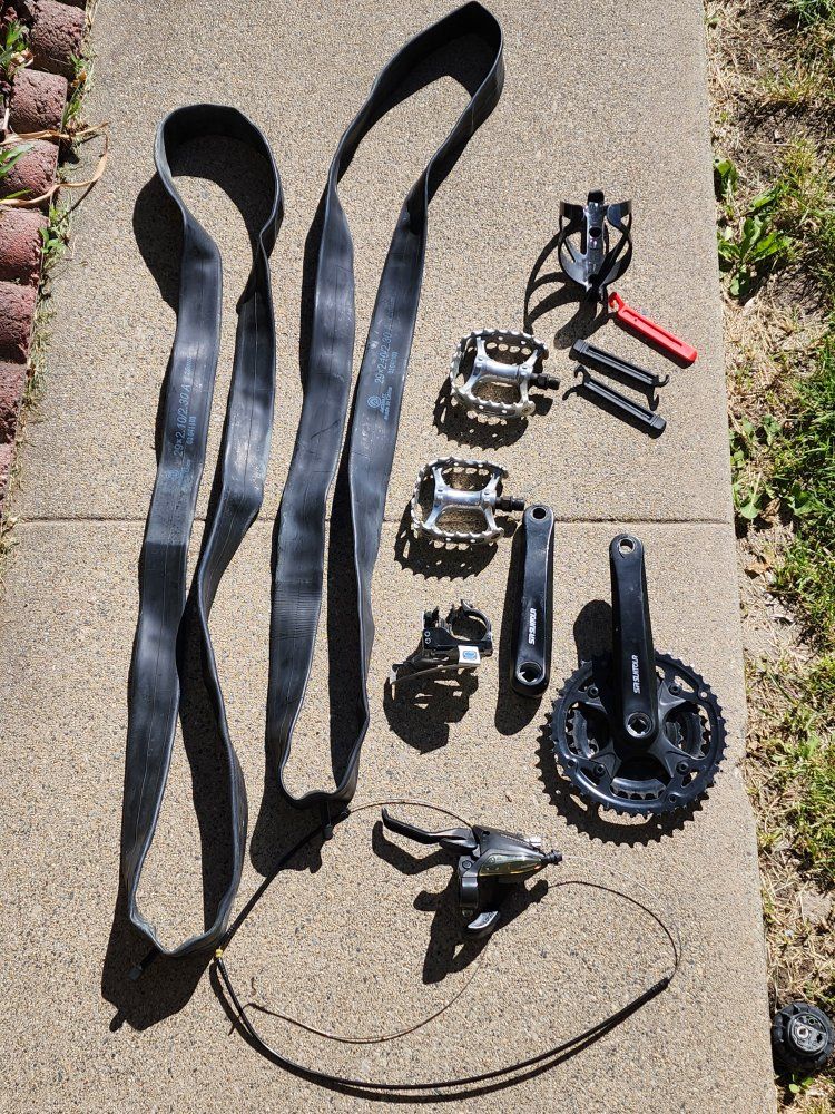 Suntour Cranks, Shimano Shifter brake Derailer, petals, Two 29" Tubes, bottle holder, & tire levers!