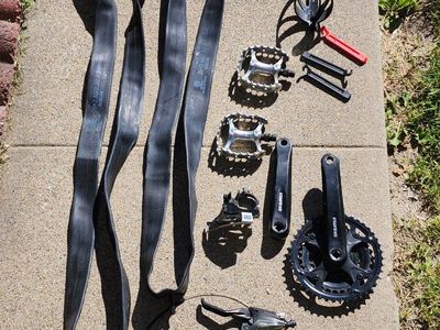 Suntour Cranks, Shimano Shifter brake Derailer, petals, Two 29" Tubes, bottle holder, & tire levers!