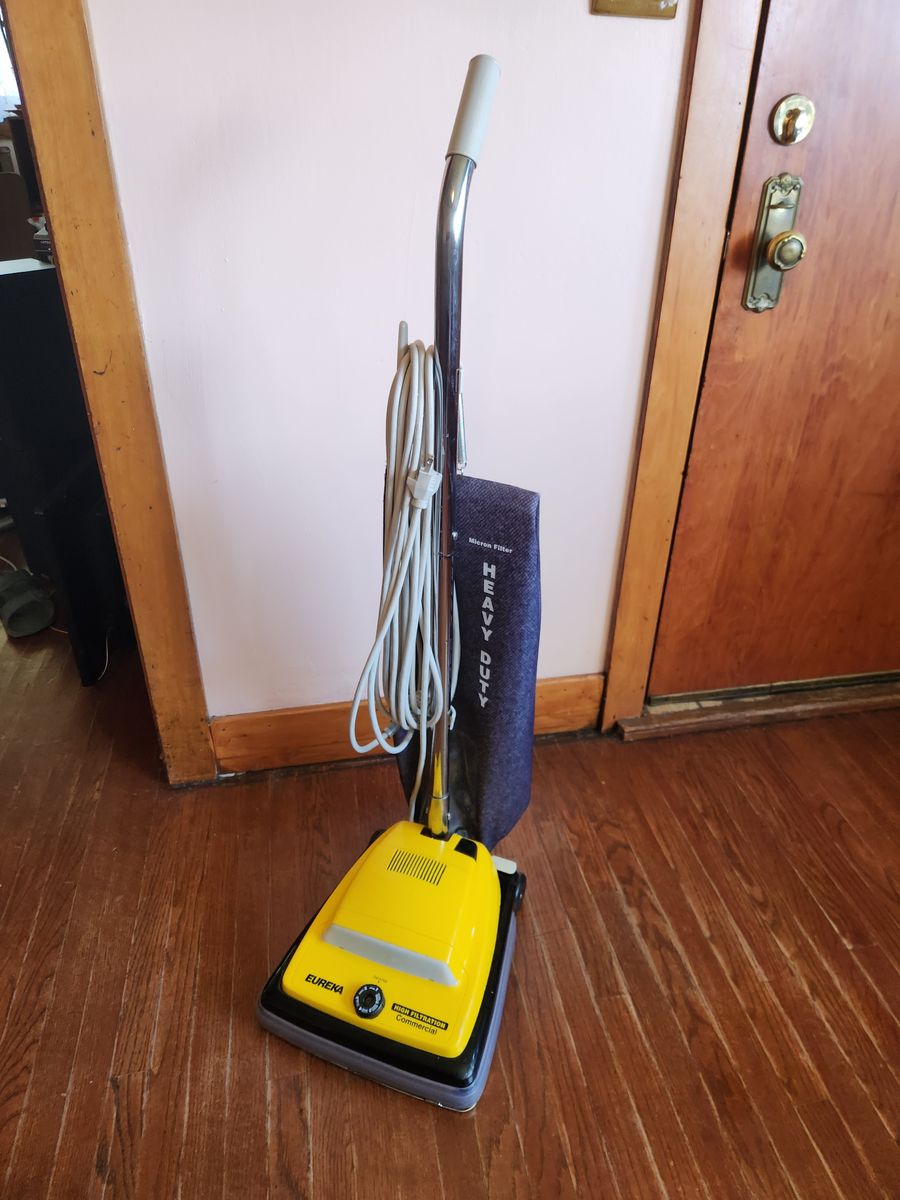 Eureka Commercial Heavy Duty upright bagged vacuum.  Takes F&G bags.  Works great.  Better than any bag-less vacuum.