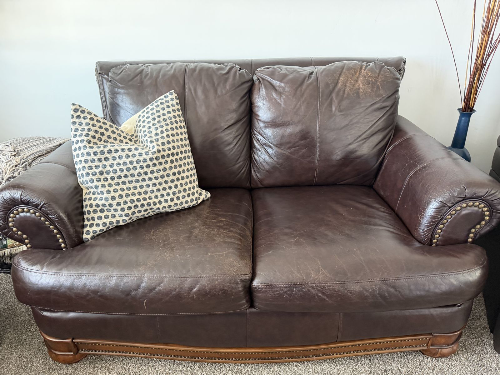 2 Brown leather loveseat