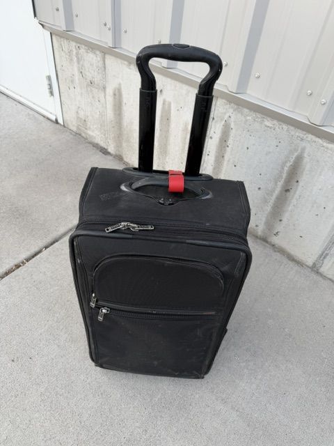 Tumi Luggage. Roll along Tumi Suitcase