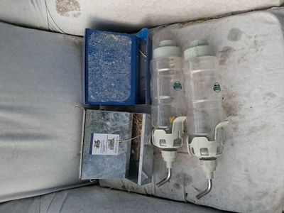 bunny feeders and water bottles