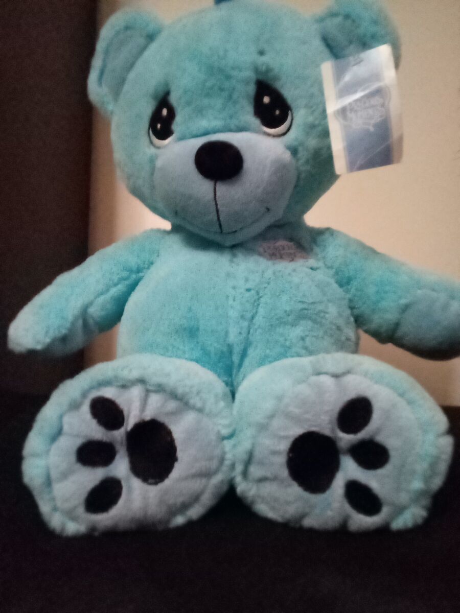 Precious moments bear with tags