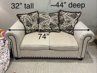 Cream Loveseat Couch 74" Wide with Nailhead Trim and Patterned Pillows