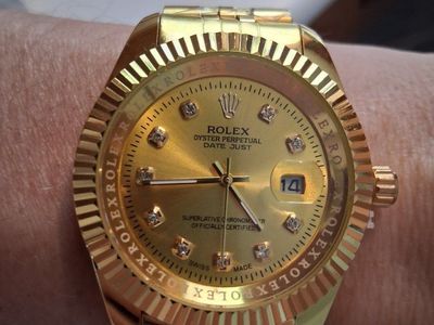 Rolex Oyster Perpetual Datejust Gold Tone Watch with Diamond Markers