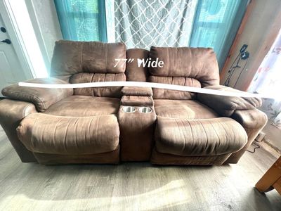 Brown love seat couch
