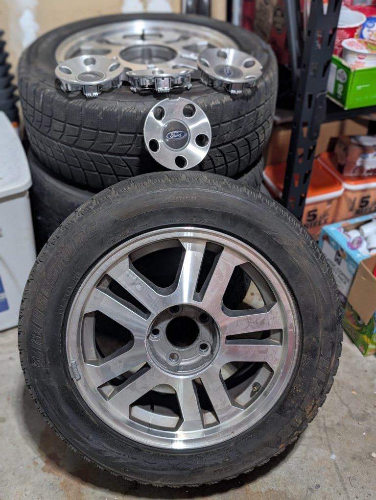 Ford Mustang OEM Ford Wheels and Tires with Center Caps