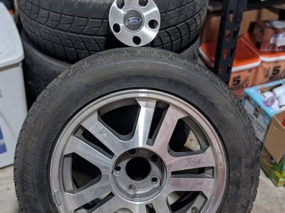 Ford Mustang OEM Ford Wheels and Tires with Center Caps