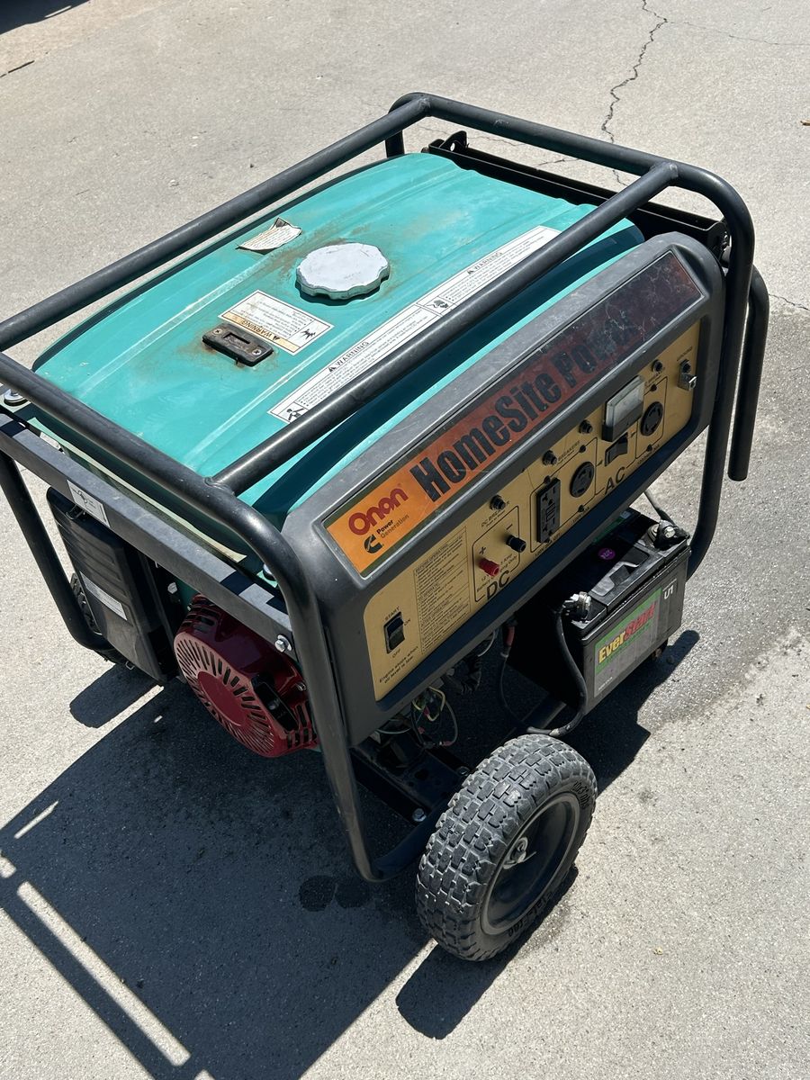 Onan Cummins HomeSite Power Portable Generator 6500 with Wheel Kit