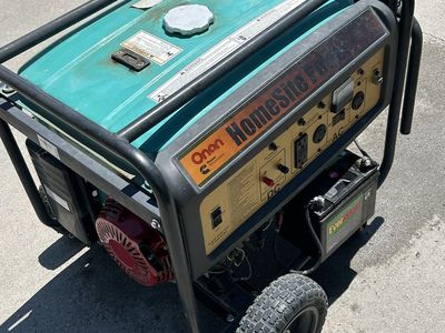 Onan Cummins HomeSite Power Portable Generator 6500 with Wheel Kit