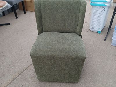 green wheeled chair