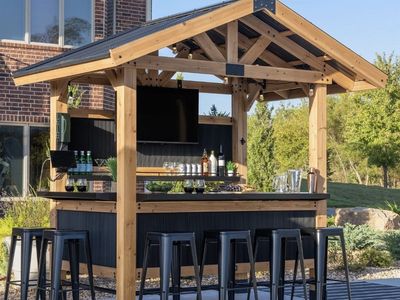 Palisade Wooden Outdoor Gazebo Bar Structure with Metal Roof & TV Mount