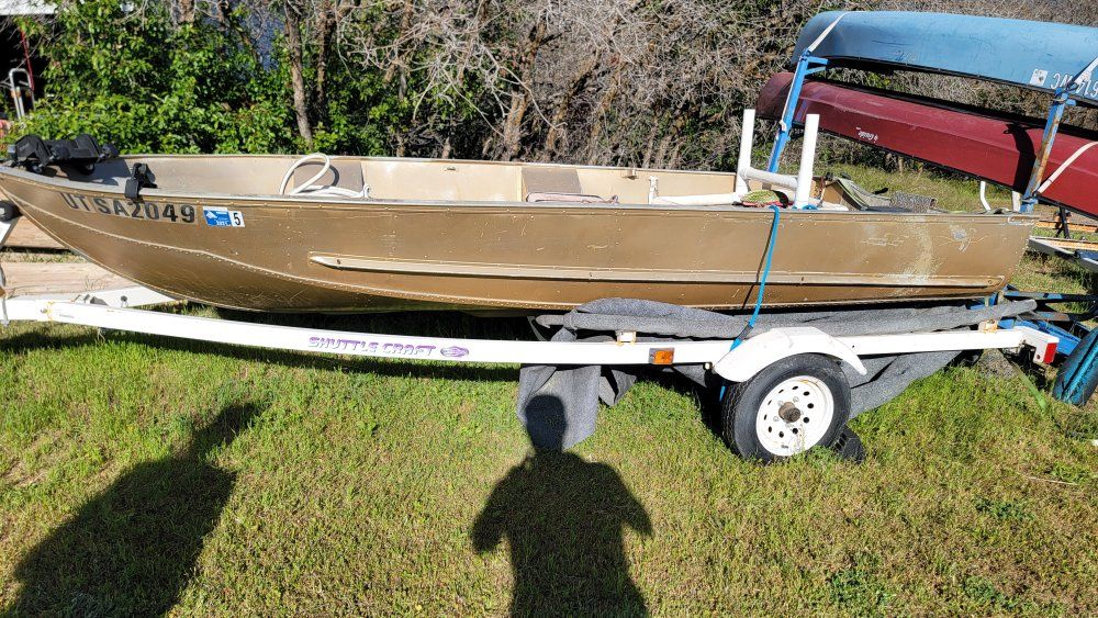 fishing boat and trailers