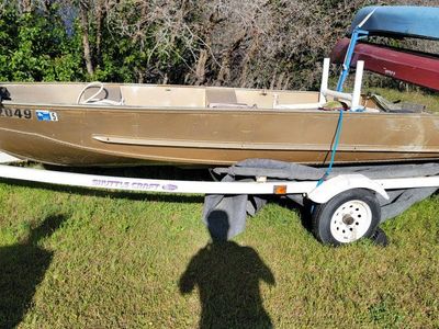 fishing boat and trailers