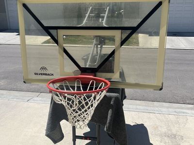 Silverback NXT 54" Adjustable Wall-Mount Basketball Hoop - Backboard & Breakaway Rim