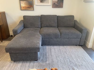 Like-New Gray Sleeper Sectional w/ Storage Chaise
