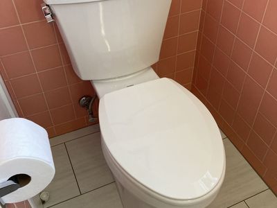 Gerber White Elongated Two-Piece Toilet with Left-Hand Chrome Trip Lever