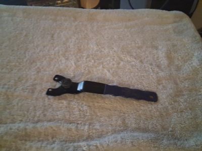 Adjustable spanner wrench.