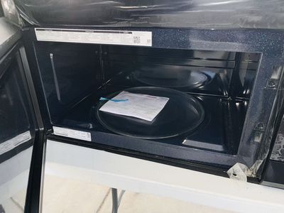 $125 OBO NEW DENTS MICROWAVES BLACK COLOR SAMSUNG