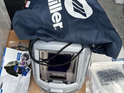 Miller T94i series auto-darkening welding helmet.