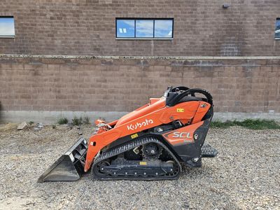Kubota SCL1000 Stand-On Track Loader - Compact & Powerful Excavator