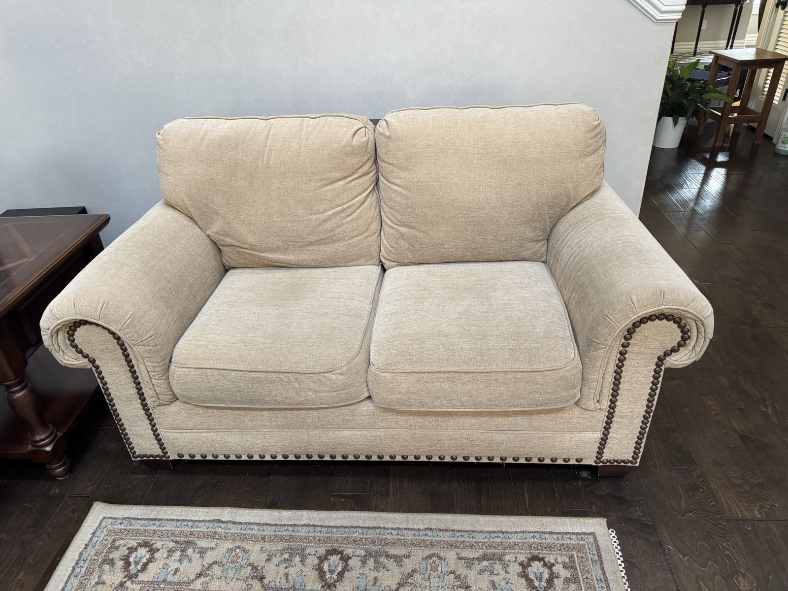 3-Piece Beige Fabric Living Room Set - Loveseat, Armchair, and Matching Ottoman with Nailhead Trim