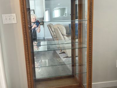 Oak Finish Lighted Curio Cabinet with Mirrored Back and Glass Shelves
