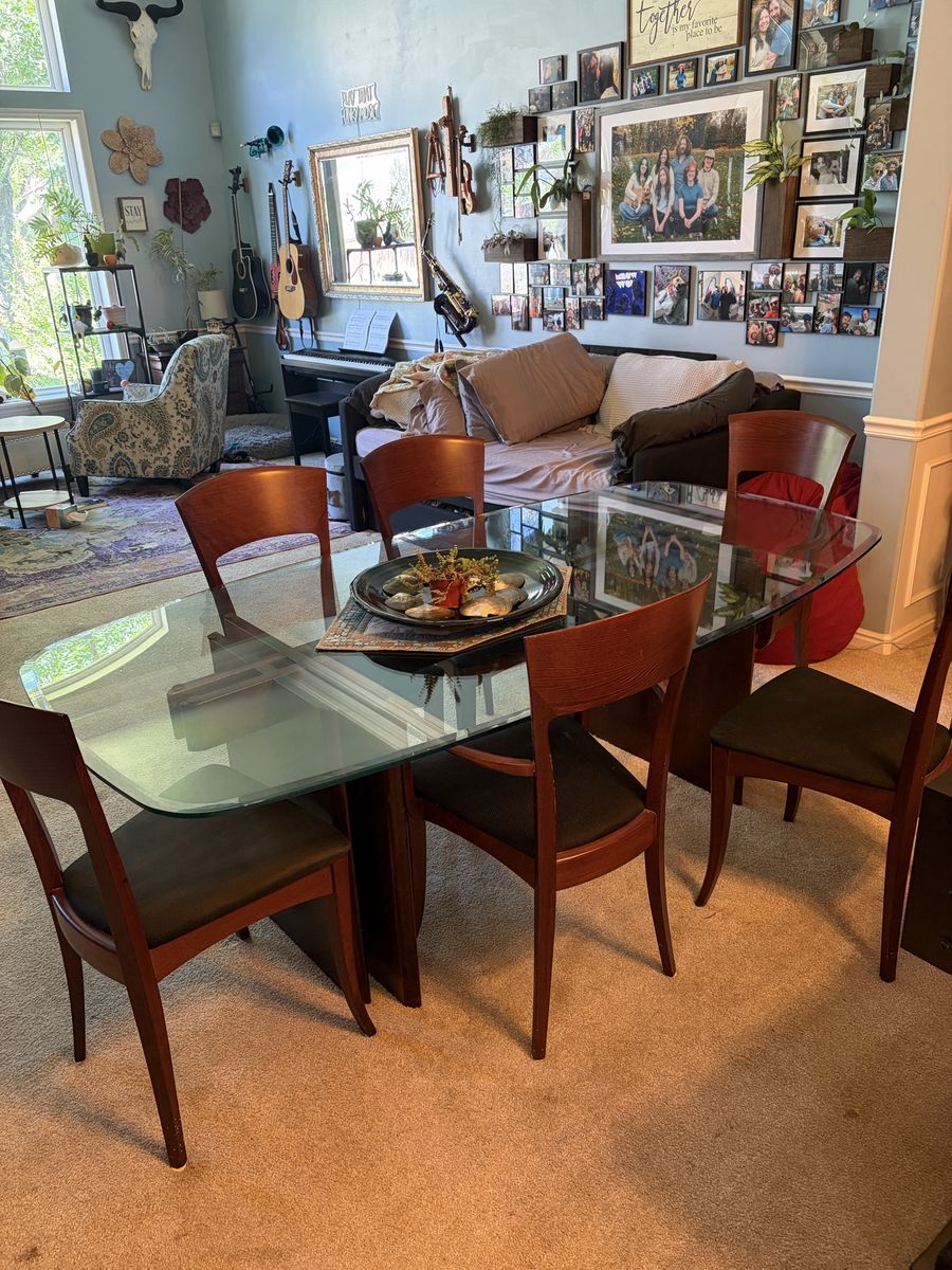 Glass dining room table and 6 chairs