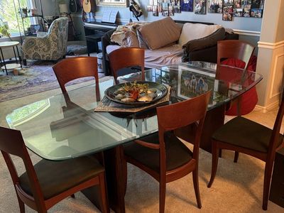 Glass dining room table and 6 chairs