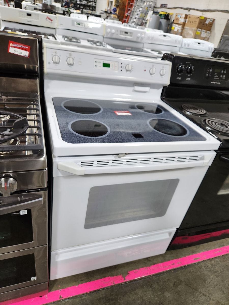 LOW PRICE GUARANTEED! GE GLASS TOP RANGE