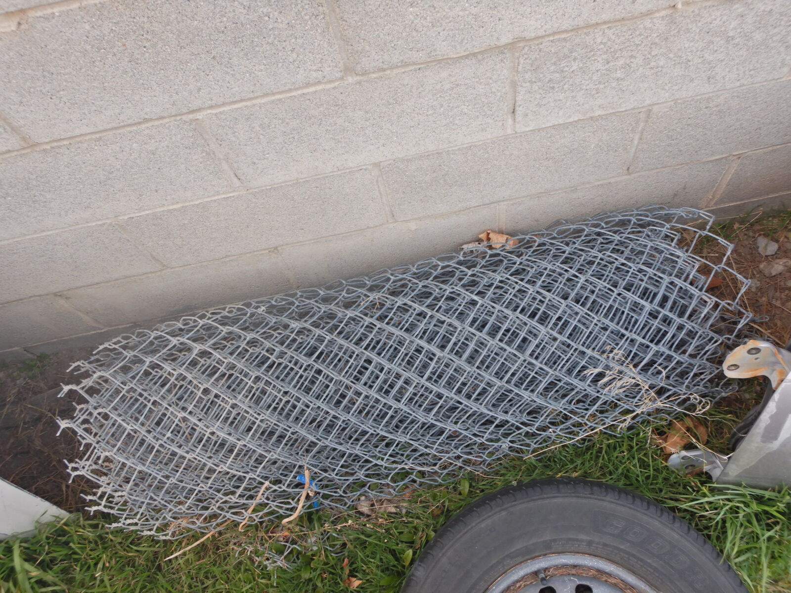 15 foot to 25 foot chain link fence about 4 feet tall (not sure on the actual length.) chicken garden