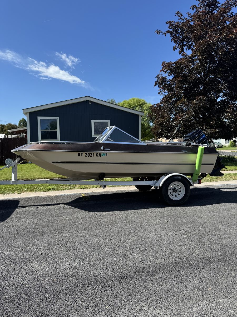 Boat with Mercury Outboard Motor