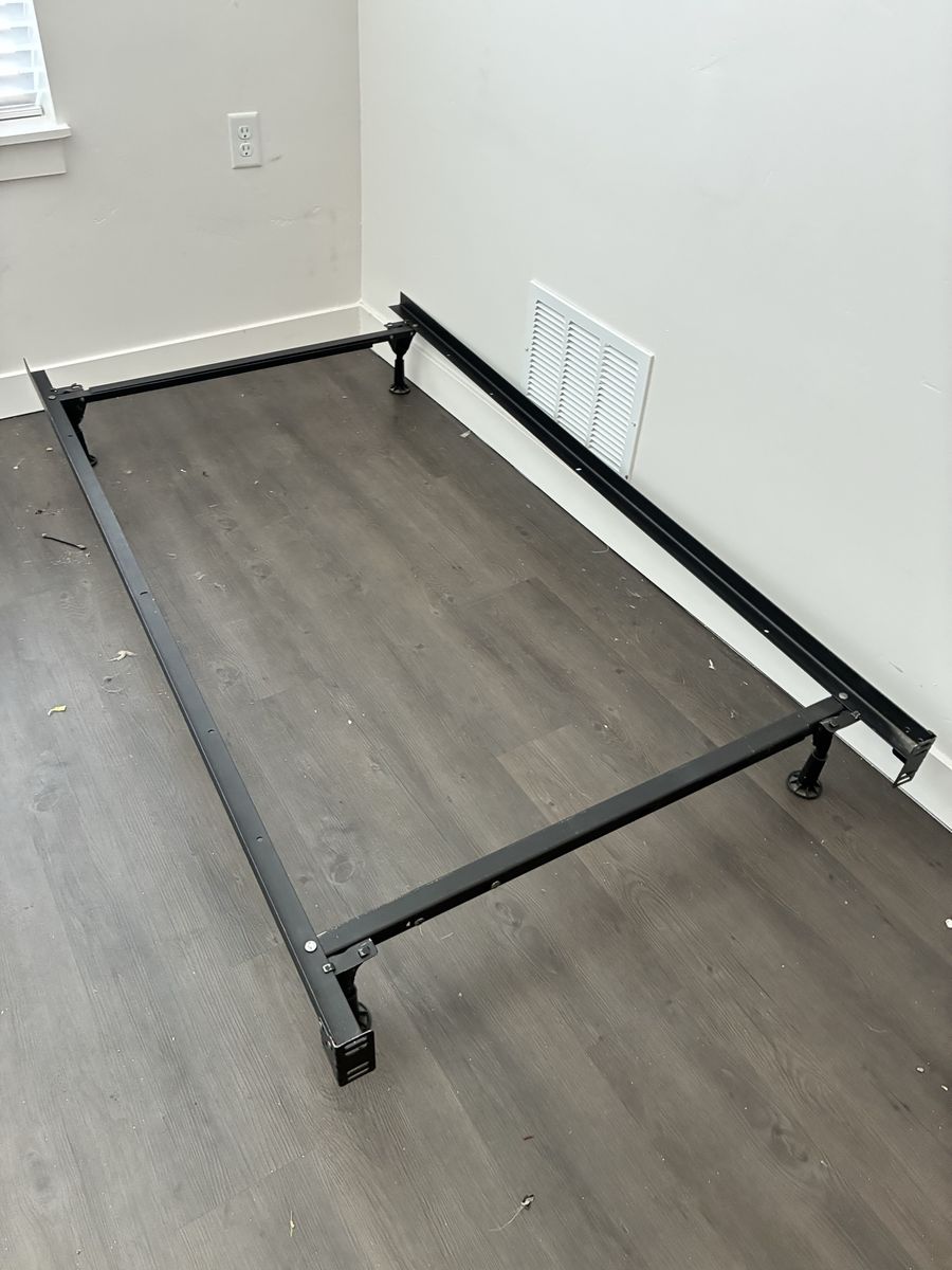 Metal bed frame. Twin size. Extends for bigger mattresses