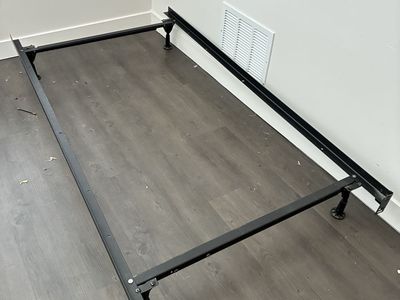 Metal bed frame. Twin size. Extends for bigger mattresses