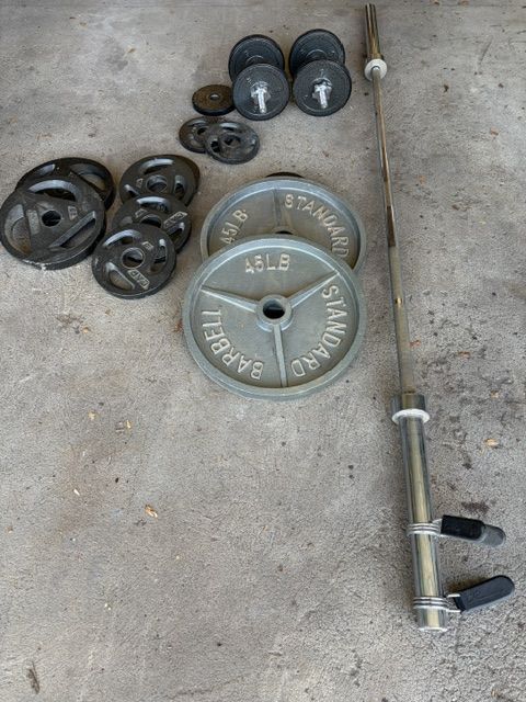Olympic barbell, plates, and dumbbells