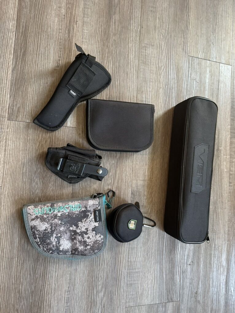 Pistol Cases And 1 Scope Case