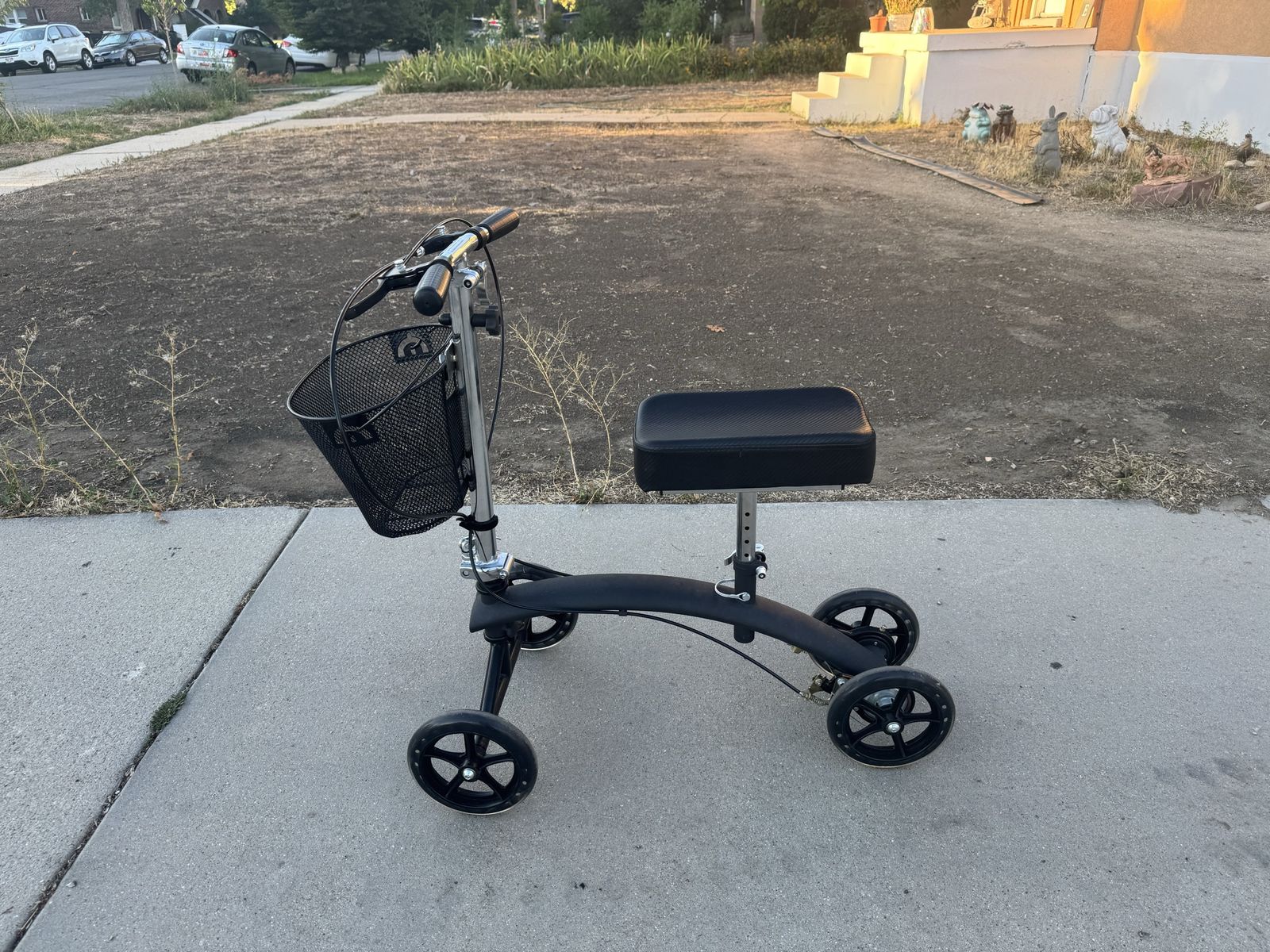 Black and Chrome Steerable Knee Scooter with Front Basket