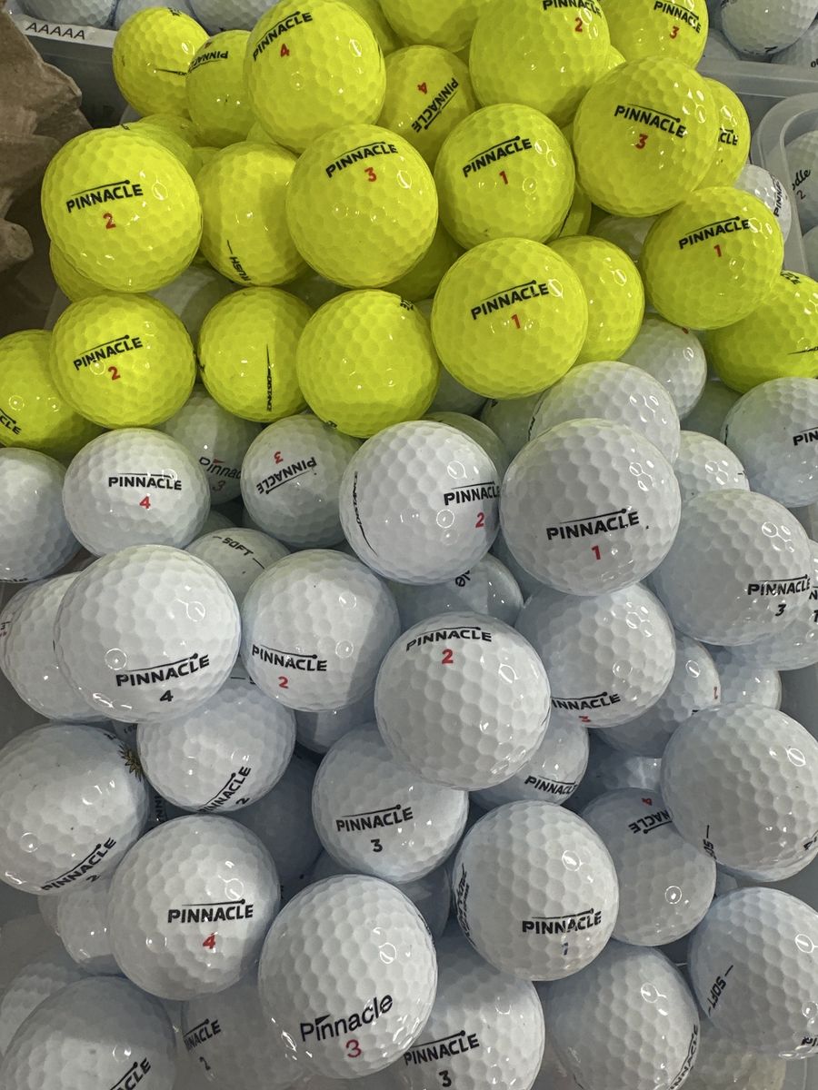 250 Like New Pinnacle Golf Balls in stock
