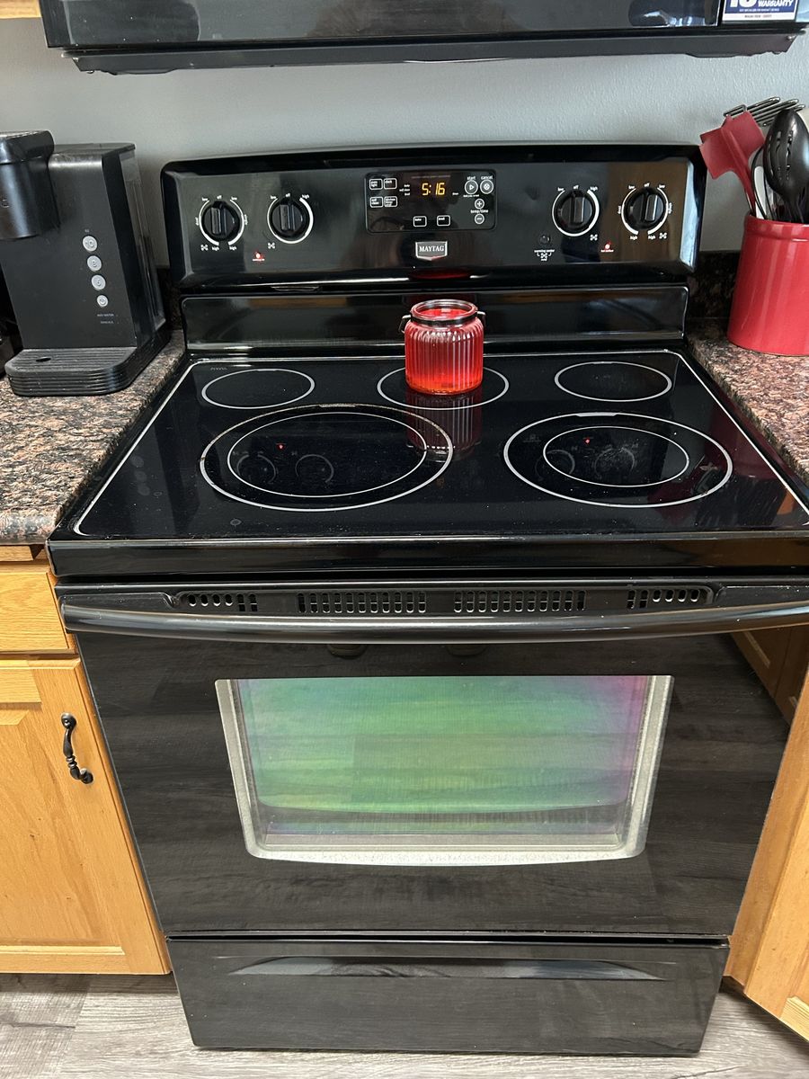 Maytag Black flat top stove