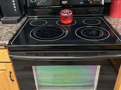 Maytag Black flat top stove