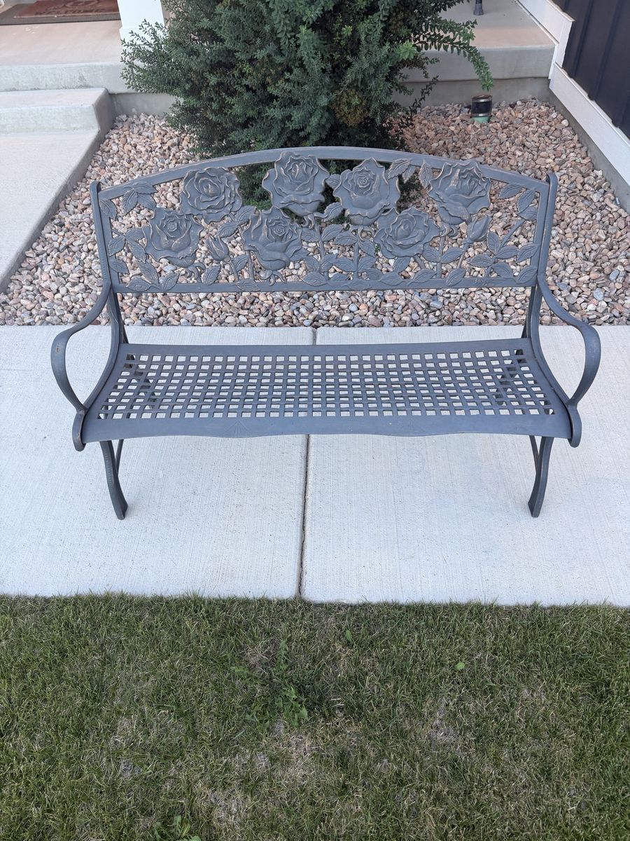 Metal Garden Bench with Rose Floral Backrest and it is 50 inches long